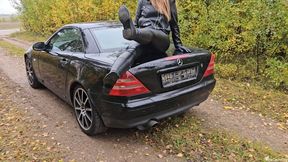Bouncing Mercedes Benz SLK on Trunk