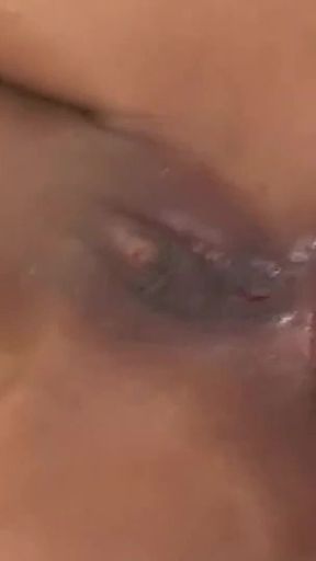 Dark Tanned Asian Vixen Nadi Phuket Takes a Facial After a Wild Butthole Drilling