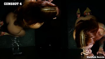 Tattooed redhead MILF Sophia Locke sucks dick in Glory Hole
