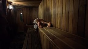 Hairy MILF gives handjob in public sauna