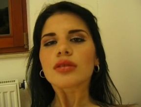 Big boobed beauty shows her hot body