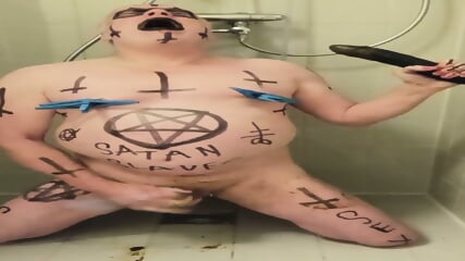 Satan slave takes delicious Enema session