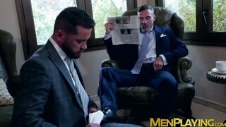 Hunky businessmen sucked and ridden by bearded colleague