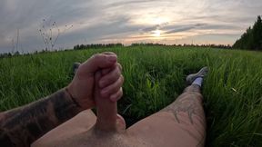 Tattooed Stud Gushes Massive Sperm Fountain In Sunset Field