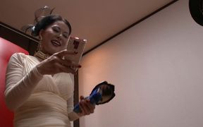 Japanese mistress dominates with whip and strap-on in intense chair bondage session