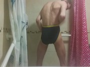 Hot very skinny guy with flat butt strokes his wet cock and pisses