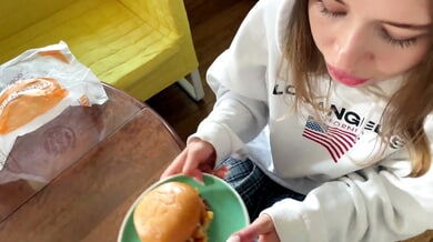 Russian woman in hoodie goes from burger to handjob and facial in the kitchen