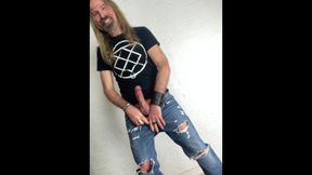 Longhairdude drains and shoots in torns denim, Fresh Rock biker shoes, tshirt