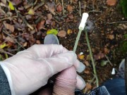 Autumn outdoor self catheter insertion, pee in forest