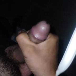 Masturbating