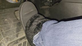 Driving in black fur boots