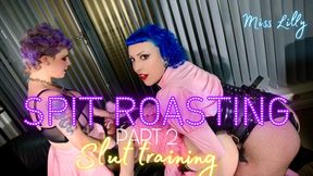 Sissy Slut Training-Part 2, Spit Roasting. Miss Lilly, the lady of the Manor, and Miss Lola Milks, continues training slut Rosie, collared and caged.