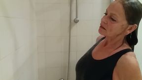 Grandma in a Tight Swimsuit Taking a Shower!