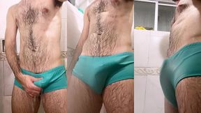 my cock growing and throbbing inside swim trunks at shower