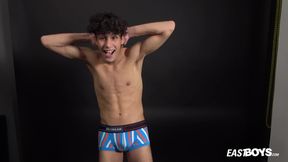 Curly twink boy shows off his slim body on webcam