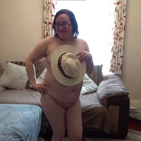 Wife dressed for summer dancing naked in just a straw hat