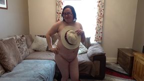 Wife dressed for summer dancing naked in just a straw hat