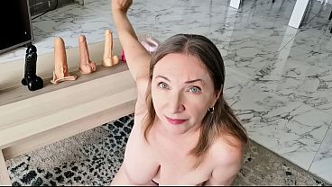 Mature MILF shows off big tits with toy play