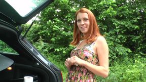 Ginger slut fingering and toying her hairy pussy in car