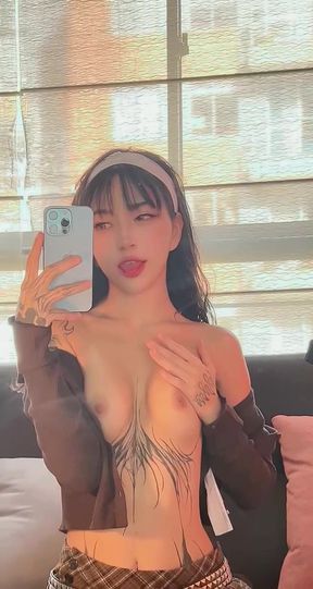 Big-titted babe shows off her ass on OnlyFans