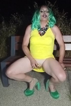 Sexy mature transvestite slut party summer showing off in a public park