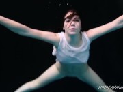 Andrejka swims naked in the pool