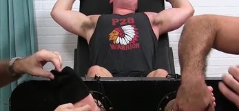 Bound athlete tickled and teased by two studs