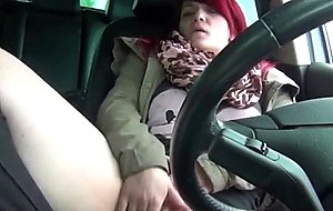 Chunky redhead fingering herself in the car