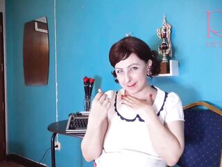 Red lipstick giving a kiss teasing by Regina Noir.