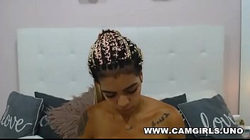 Cute latina and eating fruit on cam