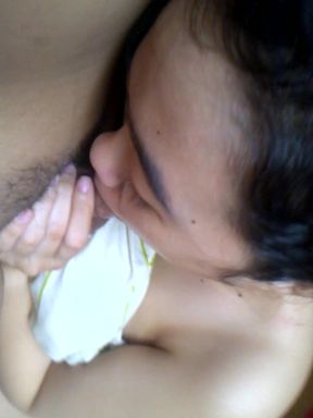 Embarrassed Asian babe gives a nude blowjob in Indonesia
