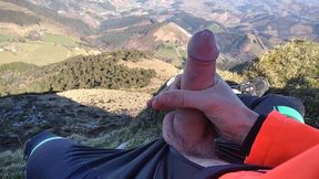 Jock in Fishnet Jerks His Big Fat Cock and Cums on Top of the Mountain