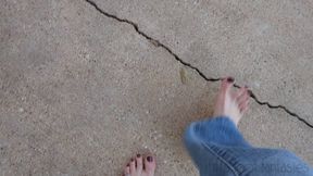 Fifi pedal pumping barefoot in blue jeans with toe rings and anklet