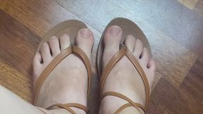 toe tapping in greek sandals