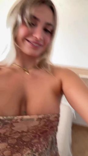Teen blonde shows off her cute body