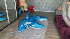 nacked Valeri ride and pop inflatable whale