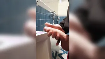 Johnholmesjunior caught jerking big cock in busy Vancouver park bathroom