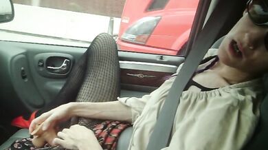 MILF widow squirts dildo in car while driving highway