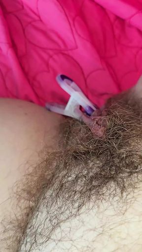 Whore Puts Clamps On Her Labia And Clit