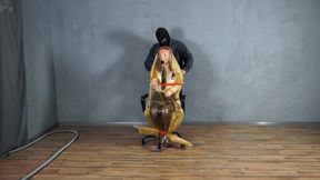 New secretary in vacuum sheathing and bondage with red ropes