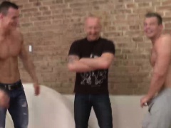 Two blokes and one strong daddy take turns and armwrestle