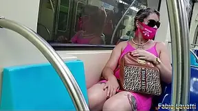 Naughty Latina shows off her tattoos and massive boobs in public