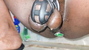 Ebony Sissy Crossdresser Piss Like Woman in Chastity Cage