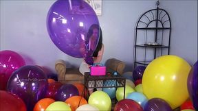 Hot looners pop and play with balloons at a party