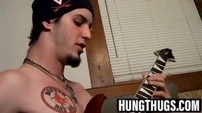 Straight Axel strums the guitar while jerking off