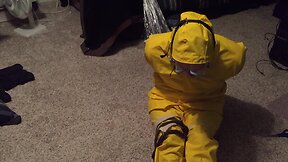 Or teenself-bondage with a yellow pvc rainsuit