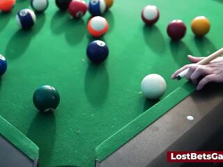 A large melons lesbo pair playing billiard and using the stick in a recent way