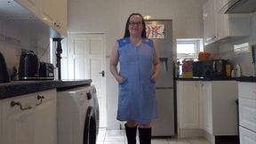 Wife in Apron stripping in boots