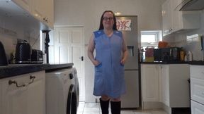 Wife in Apron stripping in boots