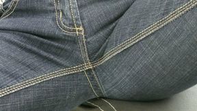 Stand over the camera in jeans MP4 HD 720p